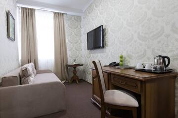Фото номера Двухместный номер «Комфорт» с 1 кроватью и гостиной Отель West Park Hotel г. Киев 3
