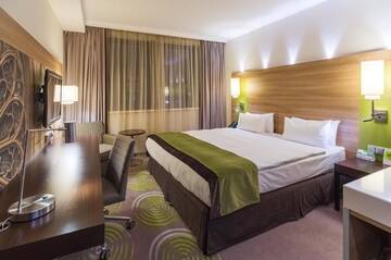 Фото номера Стандартный номер с кроватью размера &quot;king-size&quot; Отель Holiday Inn - Kyiv г. Киев 14