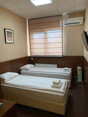 Фото номера Стандартный двухместный номер с 2 отдельными кроватями Отель irisHotels г. Киев 10