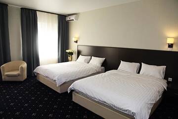 Фото номера Двухместный номер «Гранд» с 2 отдельными кроватями Отель irisHotels г. Киев 11