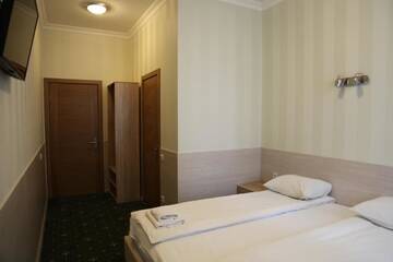 Фото номера Улучшенный двухместный номер с 1 кроватью Отель irisHotels г. Киев 11