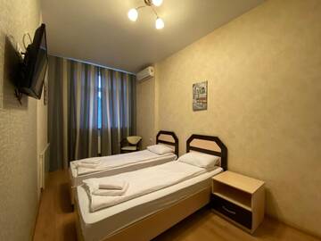 Фото номера Улучшенный двухместный номер с 2 отдельными кроватями Отель irisHotels г. Киев 4