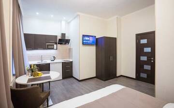 Фото номера Двухместный номер Делюкс с 1 кроватью Апартаменты 911Flat г. Киев 8