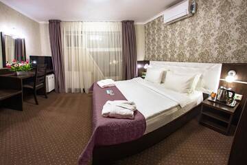 Фото номера Стандартный двухместный номер с 1 кроватью Отель Kiev 365 Park Hotel г. Киев 2