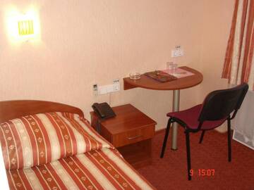 Фото номера Стандартный одноместный номер с общей ванной комнатой Отель Hotel Znannya г. Киев 2