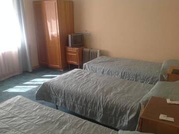 Фото номера Трехместный номер с общей ванной комнатой Отель Hotel Znannya г. Киев 4
