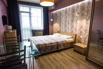 Фото номера Двухместный номер &quot;Комфорт&quot; с 1 кроватью и балконом Апартаменты Solo Apartment Драгоманова г. Киев 18