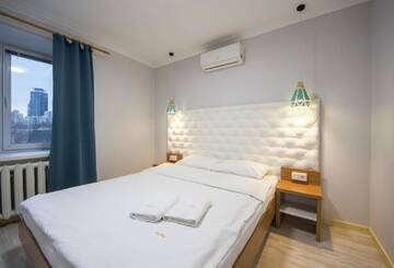 Фото номера Апартаменты с 2 спальнями - ул. Шелковичная, 46/48 Апартаменты Arena Apartments Baseina Area г. Киев 6