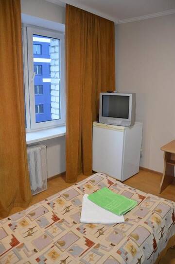 Фото номера Стандартный одноместный номер с общей ванной комнатой Мини-отель Hotel Trias г. Киев 5