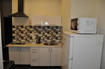 Фото номера Улучшенный двухместный номер с 1 кроватью Апартаменты Apartments on Rudanskogo г. Киев 11