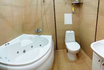 Фото номера Апартаменты с балконом Апартаменты UKR Apartments near Gulliver г. Киев 12