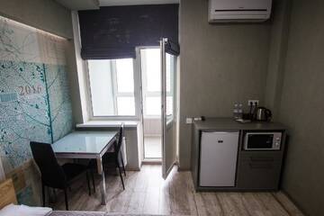 Фото номера Номер &quot;Комфорт&quot; с балконом Апартаменты Solo Apartment Ahmatovoy г. Киев 6