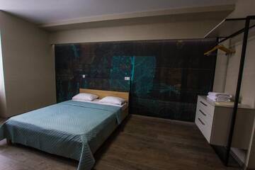 Фото номера Улучшенный номер с диваном Апартаменты Solo Apartment Ahmatovoy г. Киев 20