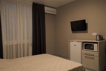 Фото номера Номер «Комфорт» Апартаменты Solo Apartment Ahmatovoy г. Киев 14
