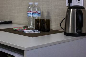 Фото номера Улучшенный номер с диваном Апартаменты Solo Apartment Ahmatovoy г. Киев 24