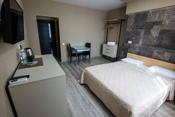 Фото номера Номер «Комфорт» Апартаменты Solo Apartment Ahmatovoy г. Киев 6