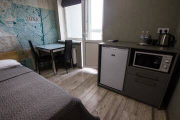 Фото номера Номер &quot;Комфорт&quot; с балконом Апартаменты Solo Apartment Ahmatovoy г. Киев 10