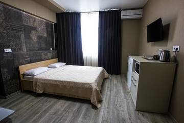 Фото номера Номер «Комфорт» Апартаменты Solo Apartment Ahmatovoy г. Киев 9