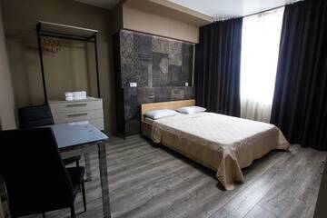 Фото номера Номер «Комфорт» Апартаменты Solo Apartment Ahmatovoy г. Киев 10