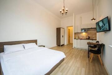 Фото номера Апартаменты с балконом и окном - Крещатик, 29 Апартаменты Central Dayflat Apartments г. Киев 3