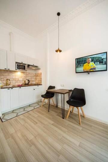 Фото номера Апартаменты с балконом и окном - Крещатик, 29 Апартаменты Central Dayflat Apartments г. Киев 4