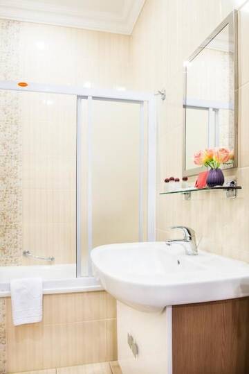 Фото номера Апартаменты с 1 спальней Апартаменты Flatlux Apartments г. Киев 36