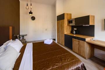 Фото номера Апартаменты с балконом Апартаменты Partner Guest House Baseina г. Киев 5