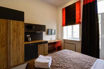 Фото номера Апартаменты с балконом Апартаменты Partner Guest House Baseina г. Киев 8