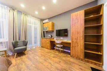 Фото номера Апартаменты с балконом Апартаменты Partner Guest House Baseina г. Киев 5