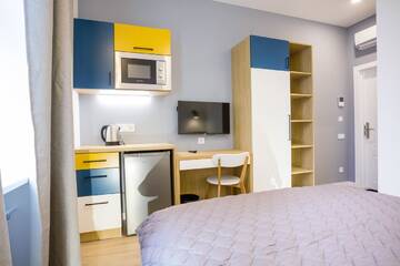 Фото номера Номер Делюкс с кроватью размера «queen-size» Апартаменты Partner Guest House Baseina г. Киев 3