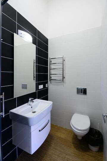 Фото номера Апартаменты с балконом Апартаменты Partner Guest House Baseina г. Киев 10