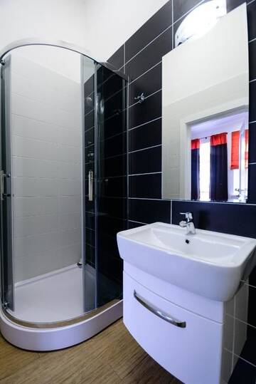 Фото номера Апартаменты с балконом Апартаменты Partner Guest House Baseina г. Киев 12