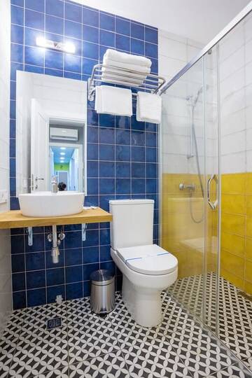 Фото номера Двухместный номер Делюкс с 1 кроватью Апартаменты Partner Guest House Baseina г. Киев 5