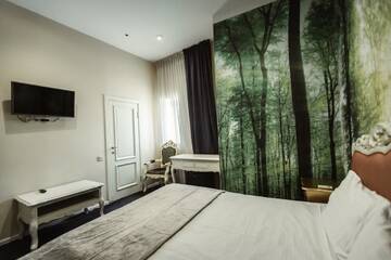 Фото номера Улучшенный двухместный номер с 1 кроватью Отель De Paris Hotel г. Киев 8