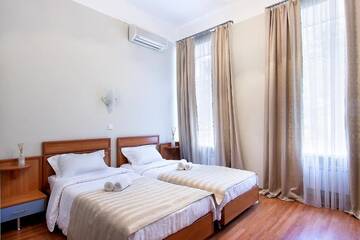 Фото номера Двухместный номер с 2 отдельными кроватями Отель Centrooms Kropivnizkogo Mini-Hotel г. Киев 12