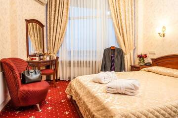 Фото номера Двухместный номер Делюкс с 1 кроватью (для 2 взрослых и 1 ребенка) Отель Отель Киев г. Киев 2