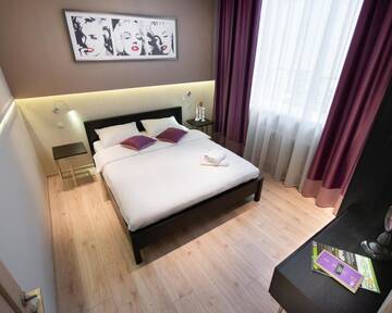 Фото номера Апартаменты с 2 спальнями Апартаменты KievApts Maydan Apartments г. Киев 13