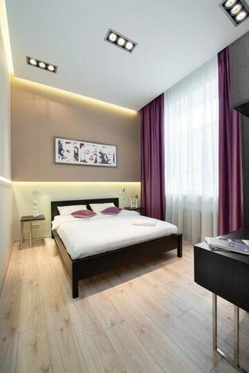 Фото номера Апартаменты с 2 спальнями Апартаменты KievApts Maydan Apartments г. Киев 11