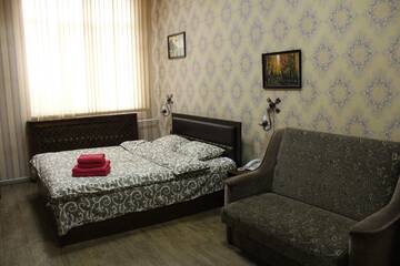 Фото номера Улучшенный двухместный номер с 1 двуспальной кроватью и диваном Отель Восход г. Киев 12