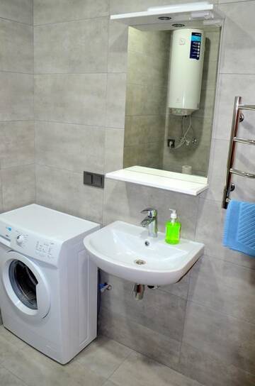 Фото номера Скандинавский лофт с кроватью размера «king-size» Апартаменты SKY Apartment Virmenska г. Киев 10