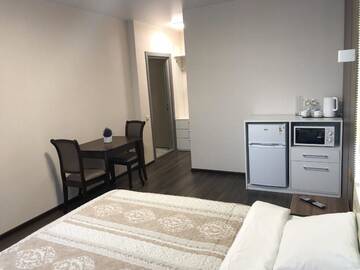 Фото номера Номер Делюкс с кроватью размера «queen-size» Апартаменты East Residence г. Киев 5