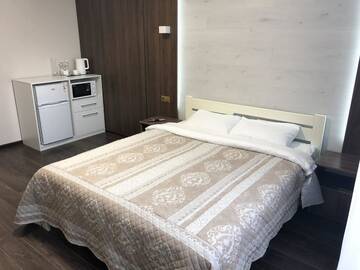 Фото номера Номер Делюкс с кроватью размера «queen-size» Апартаменты East Residence г. Киев 6