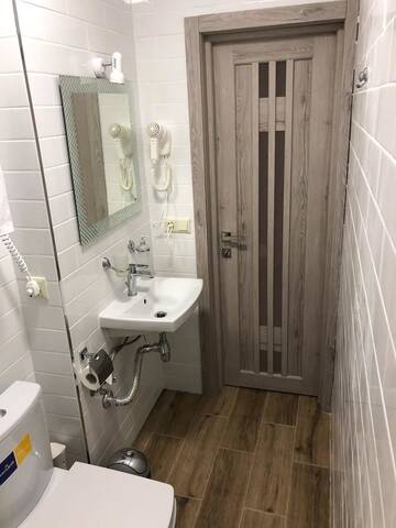 Фото номера Двухместный номер Делюкс с 1 кроватью и балконом Апартаменты East Residence г. Киев 5