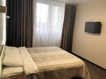 Фото номера Номер Делюкс с кроватью размера «queen-size» Апартаменты East Residence г. Киев 3