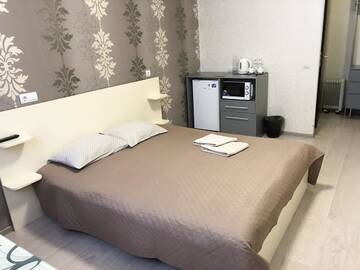Фото номера Двухместный номер Делюкс с 1 кроватью Апартаменты East Residence г. Киев 4