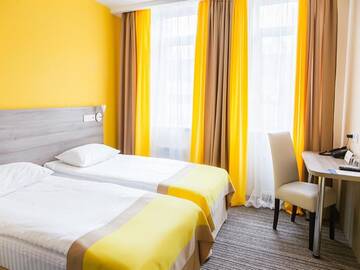 Фото номера Стандартный двухместный номер с 2 отдельными кроватями Отель Raziotel Kyiv Yamska г. Киев 10