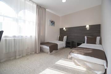 Фото номера Улучшенный двухместный номер с 2 отдельными кроватями Отель SPA Hotel Galera г. Киев 2