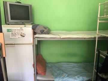 Фото номера Спальное место на двухъярусной кровати в общем номере для мужчин и женщин Хостелы Хостел Hikkaduwa Hostel г. Киев 4