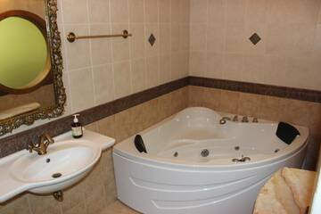 Фото номера Апартаменты - Двухуровневые Апартаменты Na Podole Apartment г. Киев 24