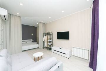 Фото номера Улучшенные апартаменты Апартаменты Apartment in Smart Plaza г. Киев 12